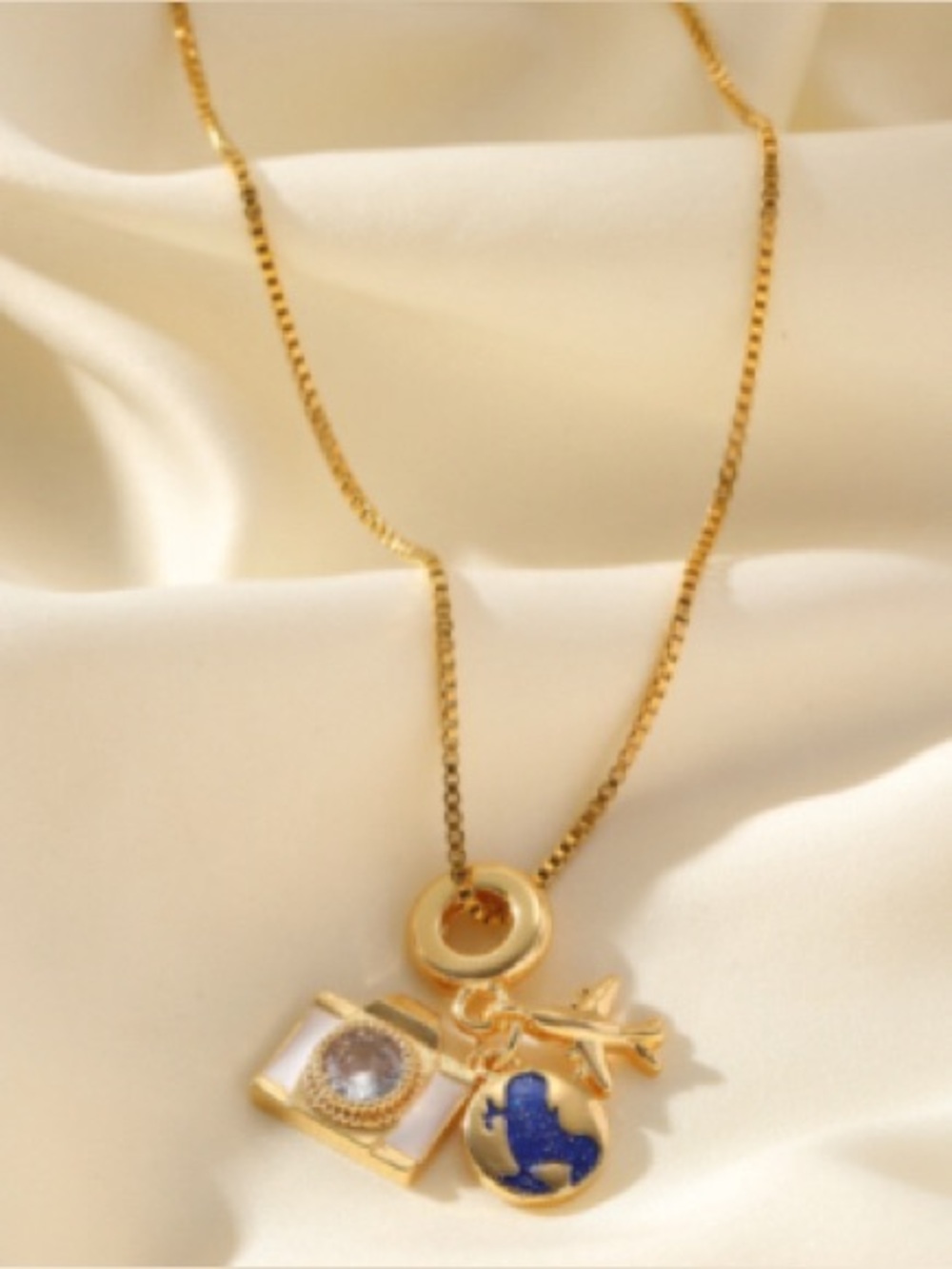 Gold Travel Charm Necklace with Blue Globe and Camera Charm
